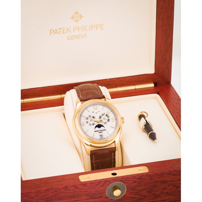 Patek Philippe. A very fine 18K gold automatic centre seconds wristwatch with annual calendar, moon phase and 48 hour power reserveRef:5146, Movement No. 3555332, Circa 2007