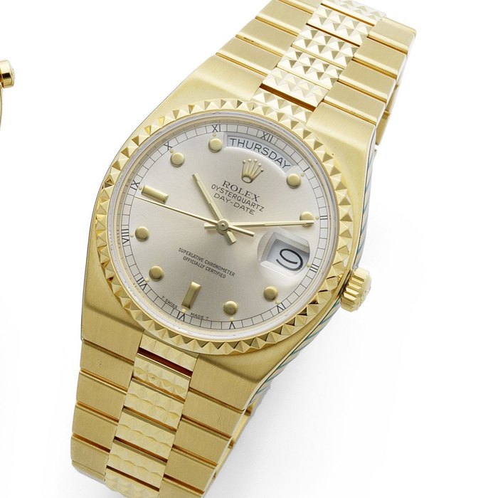 Rolex. A fine 18ct gold quartz calendar bracelet watch Oysterquartz Day-Date, Ref:19028, Serial No.915****, Movement No.012****, Circa 1985