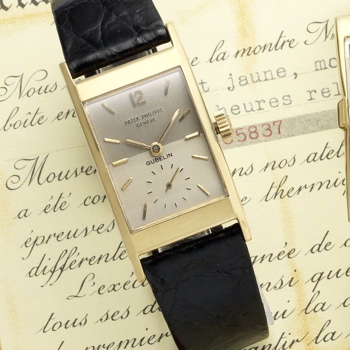 Patek Philippe. An 18ct gold manual wind wristwatch Retailed by Gubelin, Ref:2461, Case No.2600859, Movement No.977258, Circa 1965