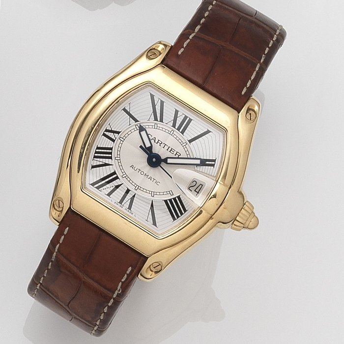 Cartier. An 18ct gold automatic calendar wristwatch Roadster, Ref:2524, Case No.116009NX, Circa 2005