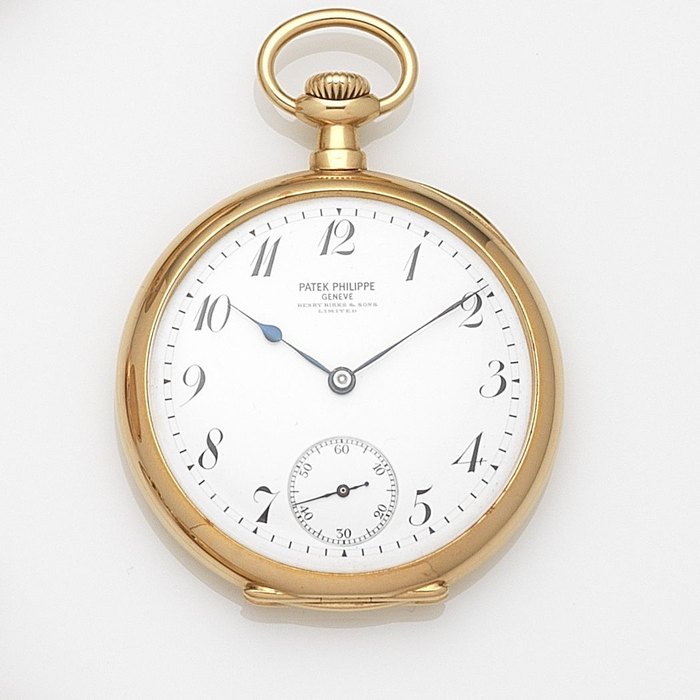 Patek Philippe. An 18ct gold keyless wind open face pocket watch Retailed by Henry Birks & Sons Limited, Case No.249782, Cuvette & Movement No.141563, Circa 1909