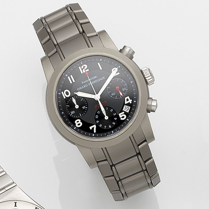Girard-Perregaux. A titanium automatic calendar chronograph bracelet watch Ferrari, Ref:8020, No.546, Movement No.03401, Circa 1998