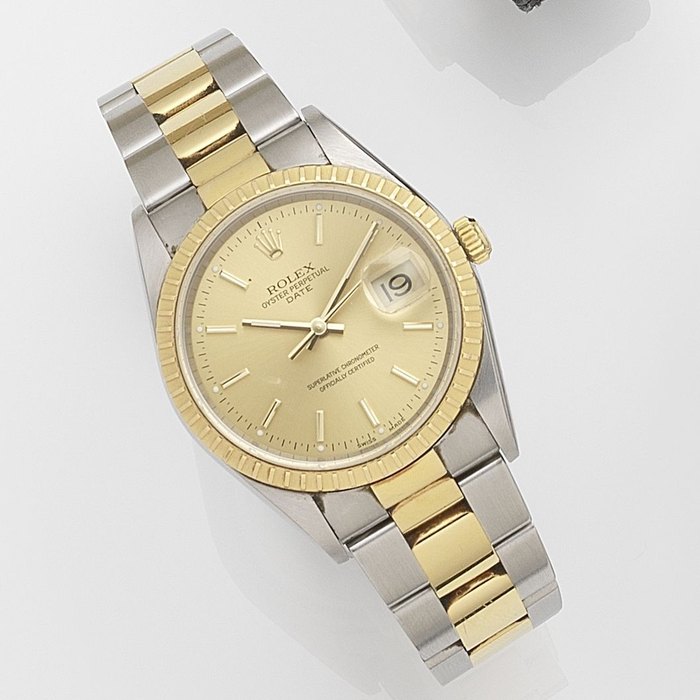 Rolex. A stainless steel and gold automatic calendar bracelet watch Date, Ref:15223, Serial No.P66****, Movement No.387*****, Sold 22nd June 2001