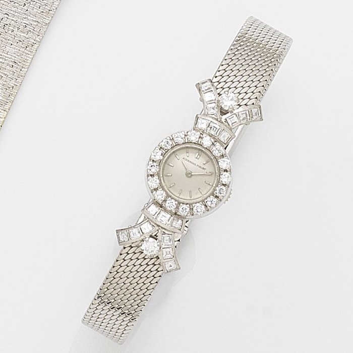 Audemars Piguet. A lady's 18ct white gold and diamond set manual wind bracelet watch Case No.17189, Movement No.72887, Circa 1958