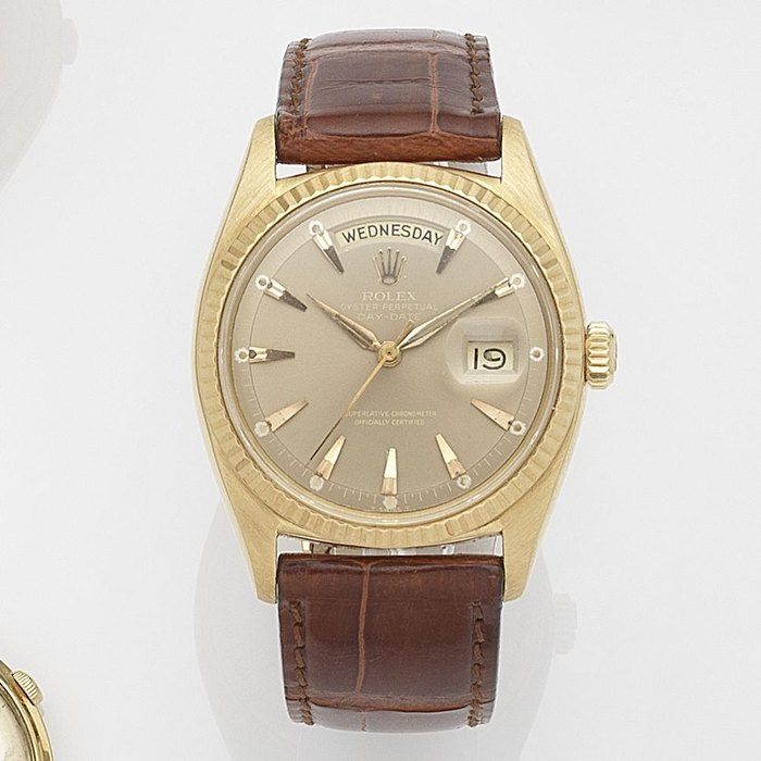 Rolex. An 18ct gold automatic calendar wristwatch Day-Date, Ref:6611, Serial No.403***, Movement No.N84****, Circa 1959