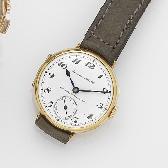 International Watch Company. An 18ct gold manual wind wristwatch Retailed by W. Horovitz Alexandrie, Case No.818997, Movement No.746417, Circa 1921