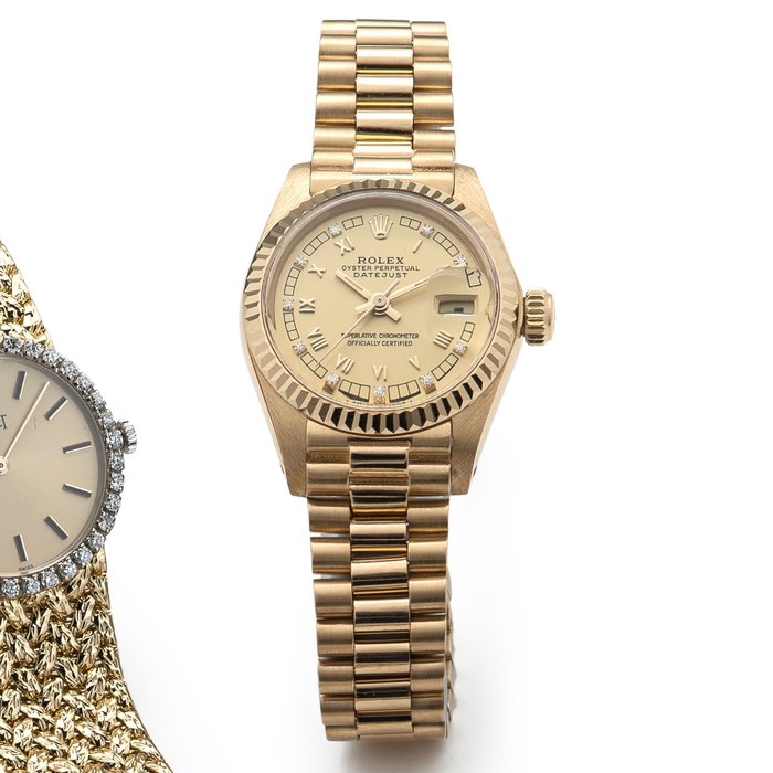 Rolex. An 18K gold and diamond set automatic calendar bracelet watch Datejust, Ref:6917, Case No.6169131, Movement No.692497, Circa 1980
