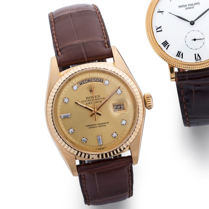 Rolex. An 18K gold and diamond set automatic calendar wristwatch Day-Date, Ref:1803, Case No.4126001, Circa 1976