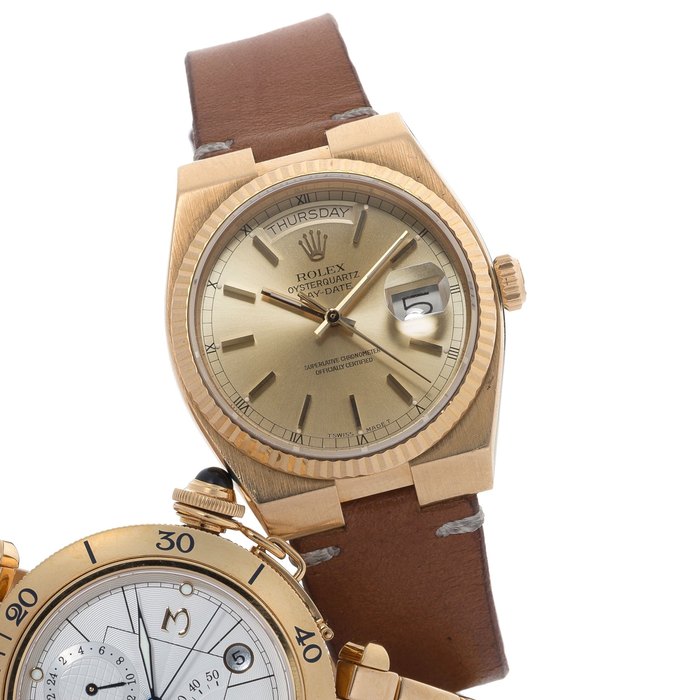 Rolex. An 18K gold quartz calendar wristwatch Oyster Quartz Day-Date, Ref:19018N, Case No.9537501, Circa 1986
