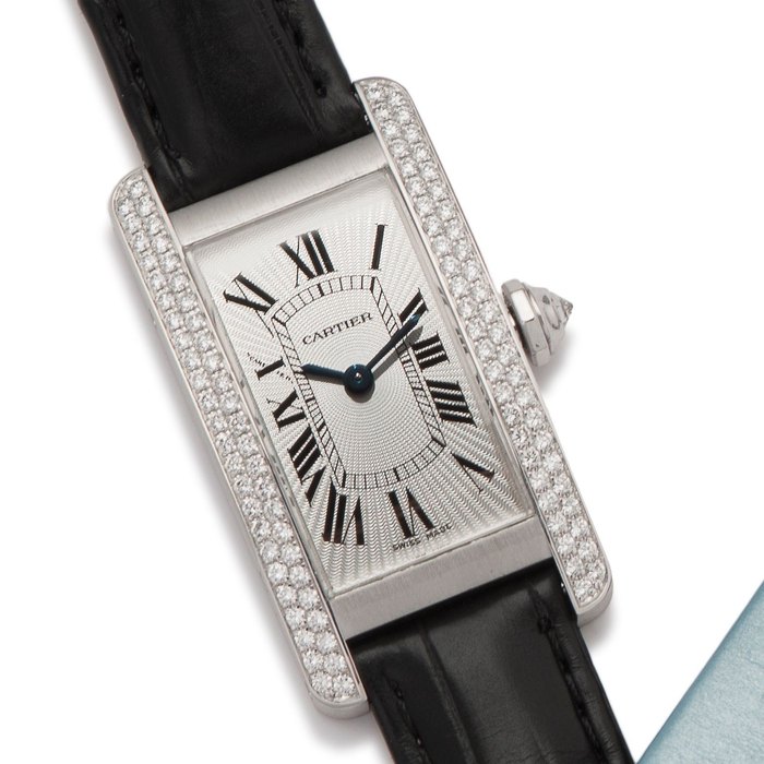 Cartier. An 18K white gold and diamond set quartz wristwatch Tank Américaine, Ref:2489, Case No.273820CE, Circa 2010
