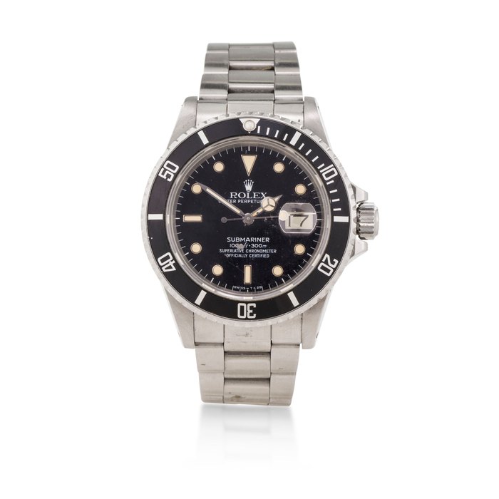 Rolex. A stainless steel automatic wristwatch with date and braceletSubmariner, Ref:16800, Serial No.9439732, Circa 1986