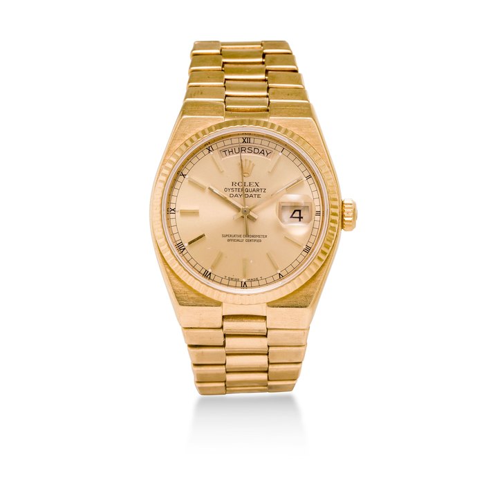 Rolex. A rare 18K gold quartz bracelet watchOysterquartz Day-Date, Ref:19018, Case No. 6349563, Circa 1979