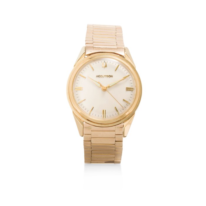Bulova. An 18K gold Accutron center seconds bracelet watchNo. D11243, 1970's