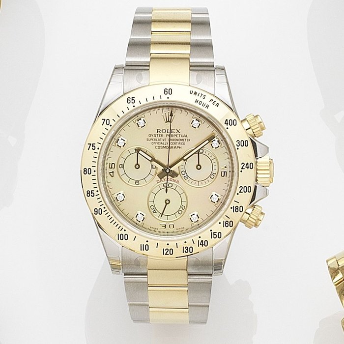 Rolex. A stainless steel and gold automatic chronograph bracelet watch Cosmograph Daytona, Ref:116523, Serial No.489*****, Movement No.616*****, Recent