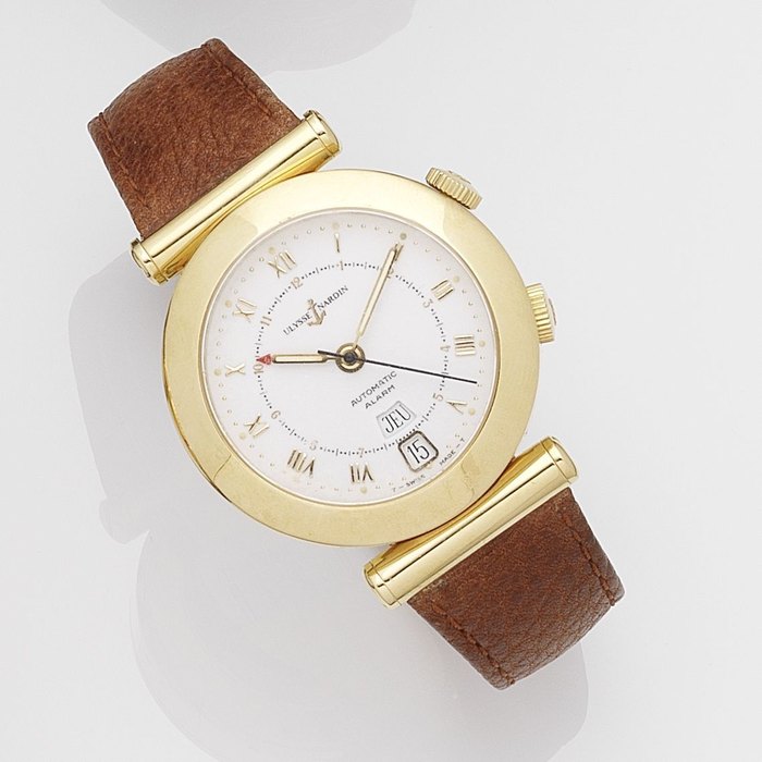Ulysse Nardin. An 18k gold automatic calendar alarm wristwatch with dual time zone Ref:601-22, No.085, Circa 1990