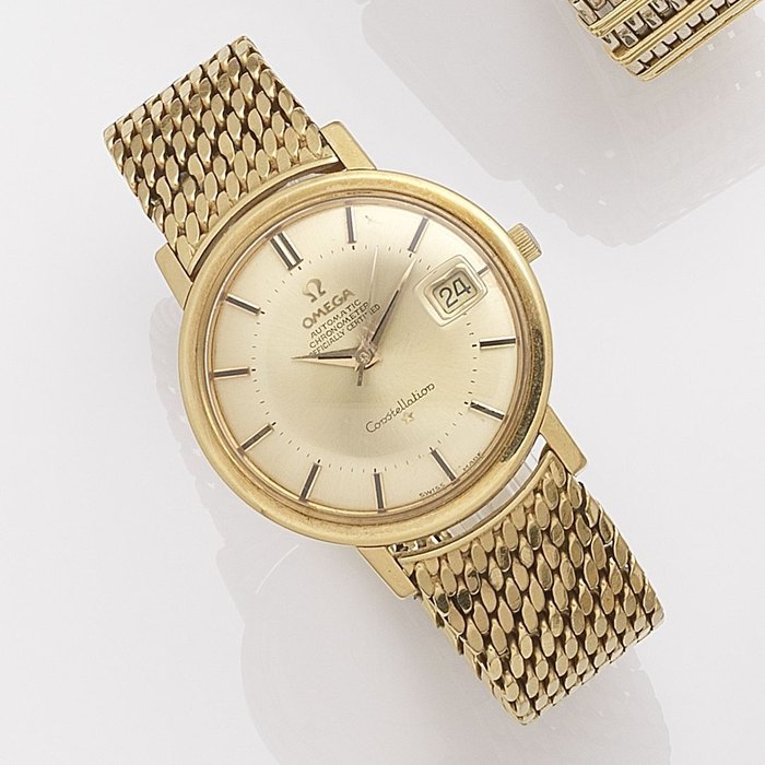 Omega. An 18k gold automatic calendar bracelet watch Constellation, Ref:168004/14 SC, Case No.975549, Movement No.24478449, Sold 25th March 1966