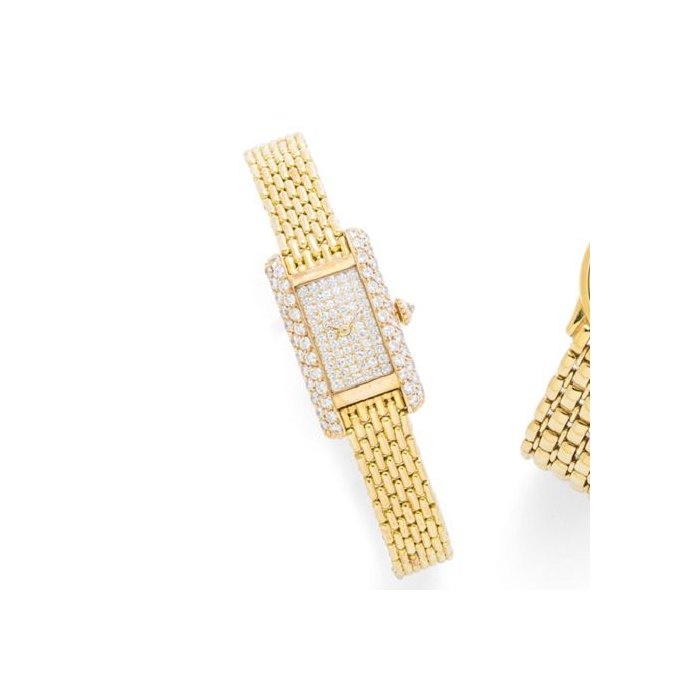 Cariter. An 18K gold and diamond set manual wind bracelet watch Tank, Case No.222290, Circa 1995