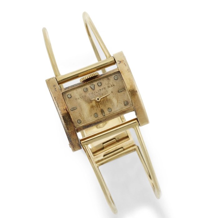 Patek Philippe. An unusual lady's 18K gold manual wind bangle watch Case No.14503, Movement No.841256, Circa 1940