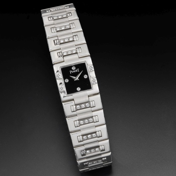 Piaget. A lady's 18K white gold and diamond set quartz bracelet watch Ref:15327 K818, Case No.540589, Movement No.96467, Circa 1990