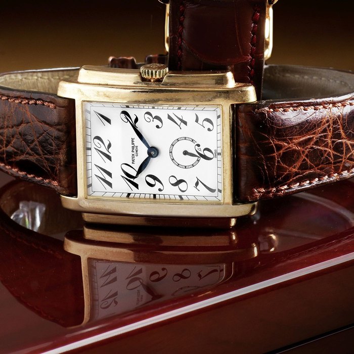 Patek Philippe. An 18K rose gold manual wind rectangular wristwatch Gondolo, Ref:5024R, Case No.2939877, Movement No.1839504, Circa 1990