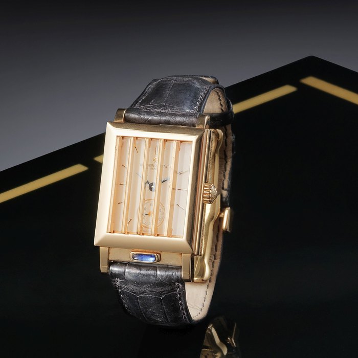Vacheron Constantin. A fine and unusual 18K rose gold manual wind rectangular shutter wristwatch with concealed dial Ref:91002/000R-8397, Case No.682324, Circa 1997