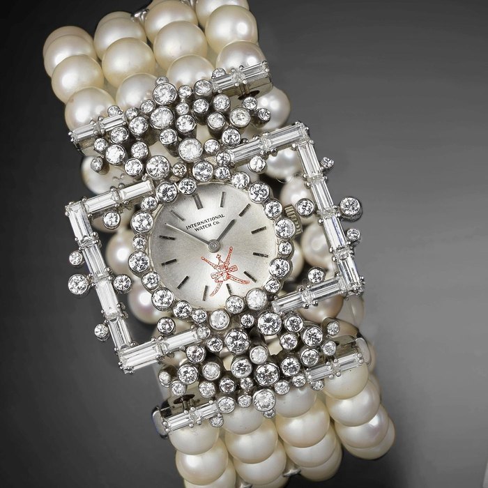 IWC. A fine and unusual lady's 18K white gold and diamond set manual wind pearl set bracelet watch Ref:148, Case No.2017843, Movement No.2048505, Circa 1970