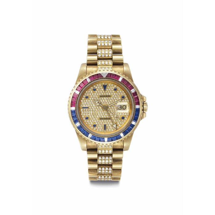Rolex Rolex. An Extremely Rare and Attractive 18k gold, Diamond, Ruby and Sapphire-set Automatic Dual Time Wristwatch with Center Seconds, Date and Bracelet Signed Rolex, GMT-Master, SARU Model, Ref. 16758, Case No. 9'067'514, Circa 1986 · 16758