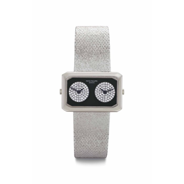 Patek Philippe. An Unusual and Attractive 18k White Gold, Onyx, and Diamond-set Dual Time Wristwatch Signed Patek Philippe, Genève, Ref. 4404/4, Movement No. 1'242'878 & 1'242'798, Case No. 2'769'839, Manufactured in 1978