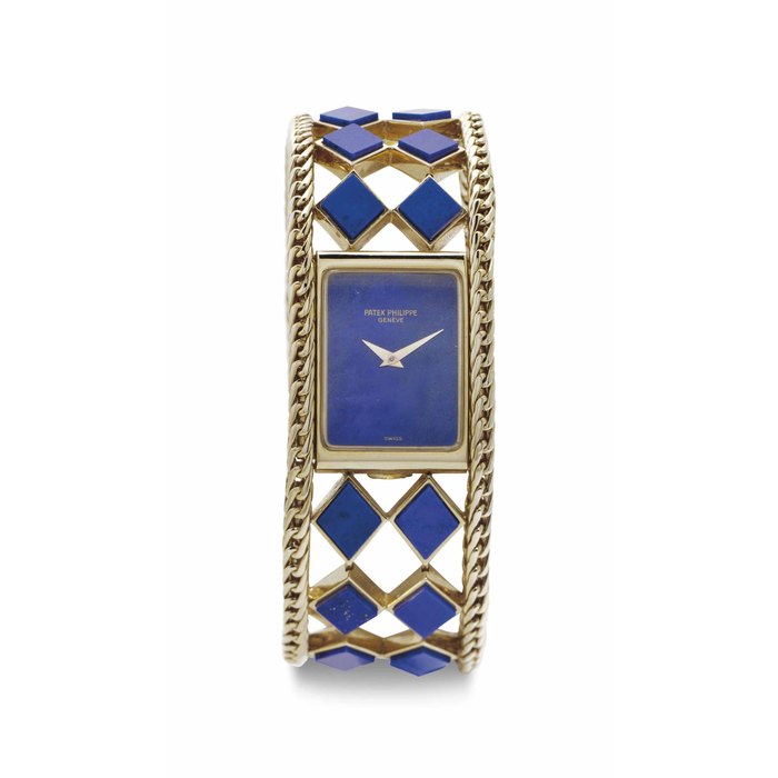 Patek Philippe. A Lady's Fine and Elegant 18k Gold and Lapis Lazuli Bracelet Watch Signed Patek Philippe, Genève, Ref. 4241/906, Movement No. 1'410'396, Case No. 2'742'953, Manufactured in 1984