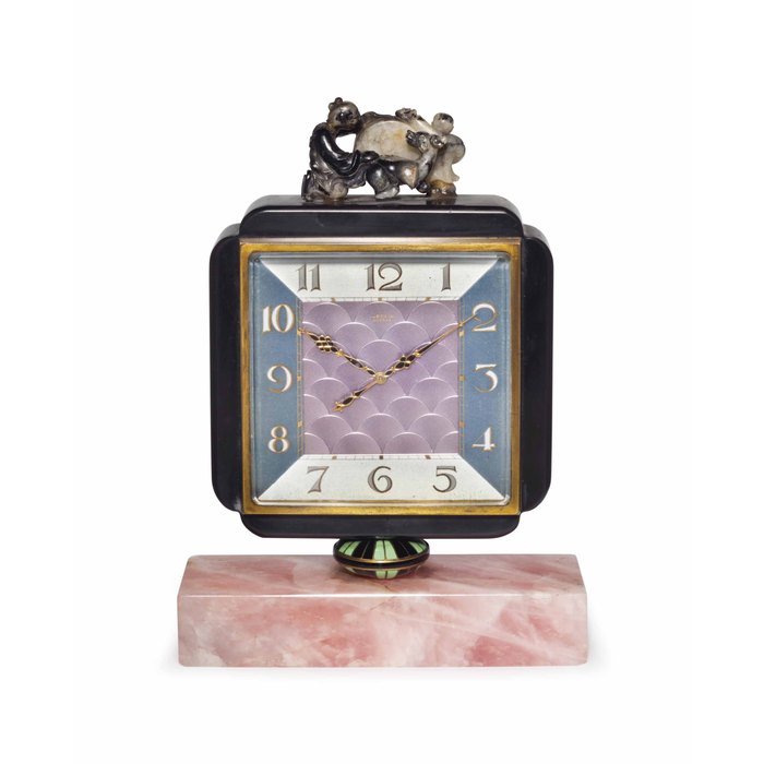 Gübelin. A Fine and Very Attractive Art Deco Gilt Brass, Hardstone, Rose Quartz and Enamel 8-Days Desk Clock Signed Gübelin, Lucerne, 8 days, No. 23'068, Circa 1935