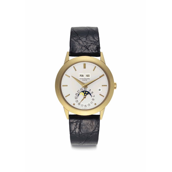 Patek Philippe. A Very Fine and Rare 18k Gold Automatic Perpetual Calendar Wristwatch With Moon Phases and Leap Year Indication Signed Patek Philippe, Genève, Ref. 3450, Movement No. 1'119'775, Case No. 2'808'552, Manufactured in 1985