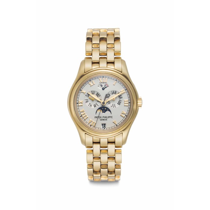 Patek Philippe. A Fine 18k Gold Automatic Annual Calendar Wristwatch Center Seconds, Power Reserve, Moon Phases and Bracelet Signed Patek Philippe, Genève, Ref. 5036/1J, Movement No. 314'4605, Case No. 4'078'654, Manufactured in 2000