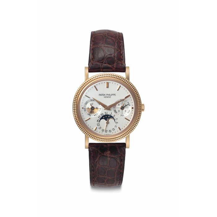 Patek Philippe. A Fine 18k Pink Gold Automatic Perpetual Calendar Wristwatch with Moon Phases and Additional Solid Case Back Signed Patek Philippe, Genève, Ref. 5039R, Movement No. 3'124'326, Case No. 4'020'169, Manufactured in 1999