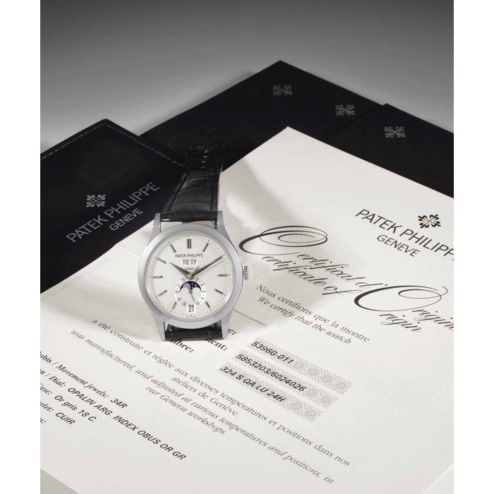 Patek Philippe. A Fine 18k White Gold Automatic Annual Calendar Wristwatch Center Seconds, Moon Phases and 24 Hour Indication Signed Patek Philippe, Genève, Ref. 5396G, Movement No. 5'853'203, Case No. 6'024'026, Circa 2015