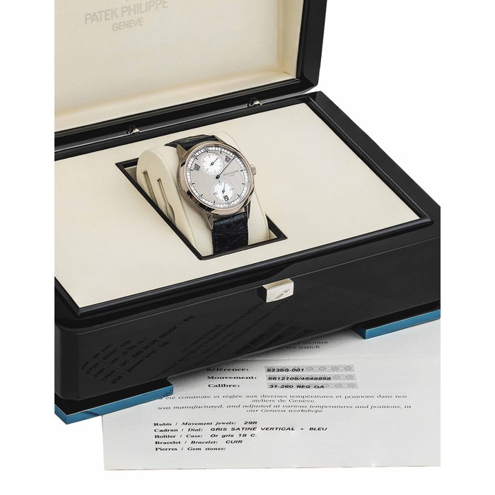 Patek Philippe. A Fine and Rare 18k White Gold Automatic Annual Calendar Wristwatch with Regulator-Style Dial Signed Patek Philippe, Genève, Ref. 5235G-001, Movement No. 5'612'109, Case No. 4'548'958, Circa 2013