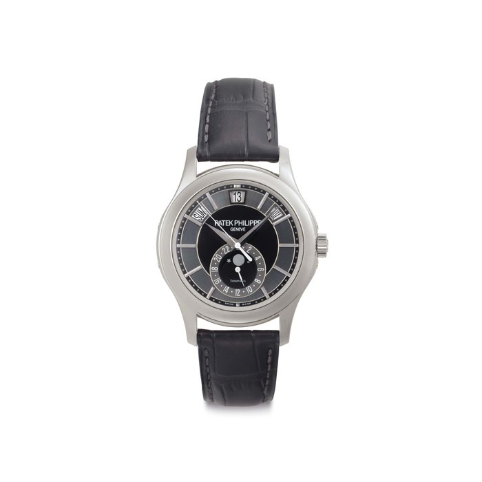 Paetk Philippe. A Fine 18k White Gold Automatic Annual Calendar Wristwatch with Moon Phases 24 Hour Indication Center Seconds and Unusual Lugs Signed Patek Philippe, Genève, retailed by Tiffany & Co., Ref. 5205G, Movement No. 5'709'621, Case No. 4'604'749, Circa 2014