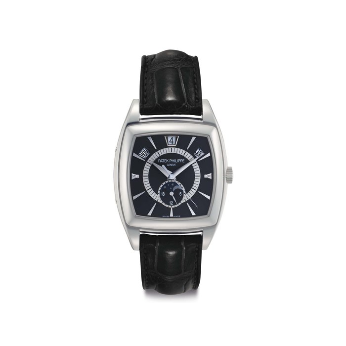 Patek Philippe. A Platinum Automatic Tonneau-shaped Annual Calendar Wristwatch Moon Phases and Diamond-set Numerals Signed Patek Philippe, Genève, Ref. 5135P, Movement No. 3'426'533, Case No. 4'365'608, Manufactured in 2007