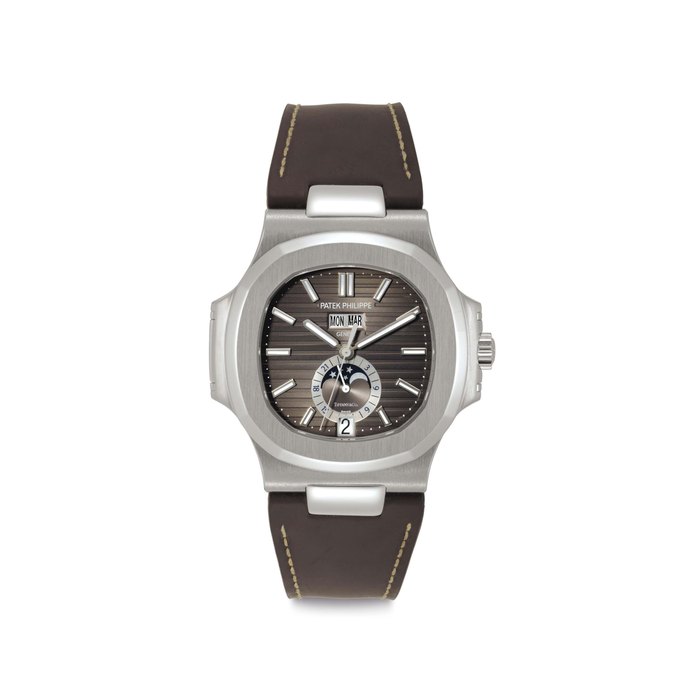 Patek Philippe. A Stainless Steel Automatic Wristwatch with Annual Calendar, Moon Phases and Day/Night Indication Signed Patek Philippe, Genève, Retailed by Tiffany & Co., Nautilus Model, Ref. 5726A, Movement No. 5'607'769, Case No. 4'752'047, Circa 2012