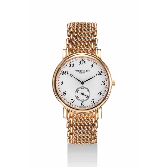 PATEK PHILIPPE. A FINE 18K PINK GOLD WRISTWATCH WITH BRACELET AND BREGUET NUMERALS SIGNED PATEK PHILIPPE, GENEVE, REF. 5022/1, MOVEMENT NO. 1'876'499, CASE NO. X'XXX'XXX, CIRCA 2005