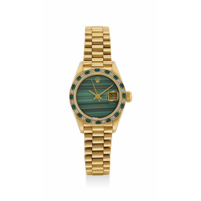 ROLEX. A LADY'S 18K GOLD, DIAMOND AND EMERALD-SET AUTOMATIC WRISTWATCH WITH SWEEP CENTRE SECONDS, DATE, BRACELET AND MALACHITE DIAL SIGNED ROLEX, OYSTER PERPETUAL, DATEJUST MODEL, REF. 69178, CASE NO. R547677, CIRCA 1987