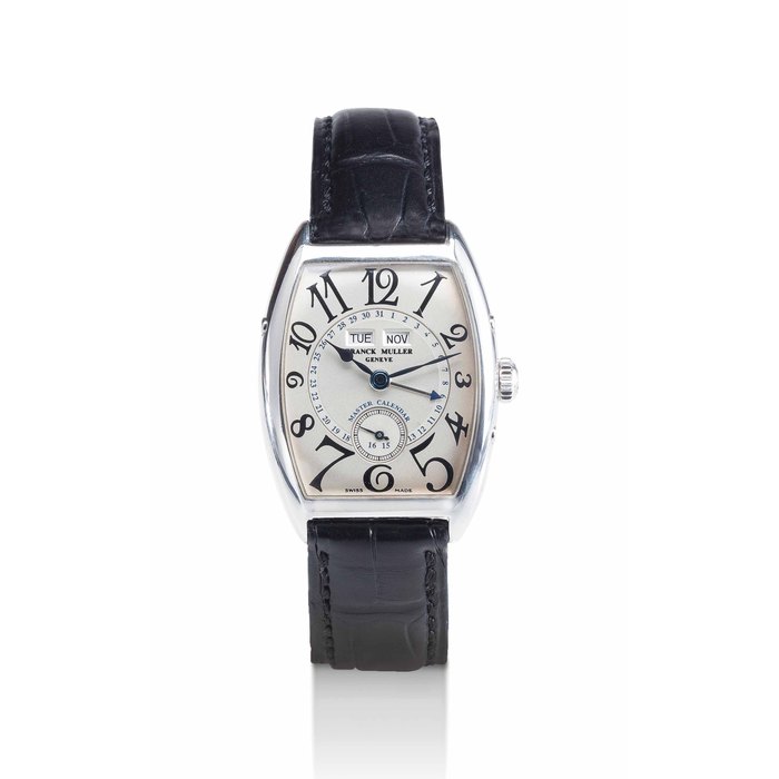 FRANCK MULLER. AN 18K WHITE GOLD TONNEAU-SHAPED AUTOMATIC TRIPLE CALENDAR WRISTWATCH SIGNED FRANCK MULLER, GENEVE, MASTER CALENDAR MODEL, NO. 13, REF. 7501 MC, CIRCA 2000