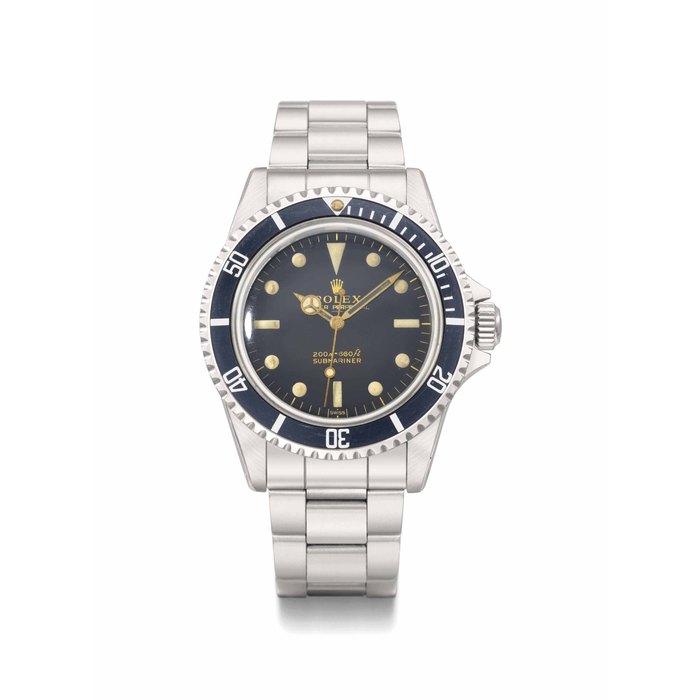 ROLEX. A VERY RARE STAINLESS STEEL AUTOMATIC WRISTWATCH WITH SWEEP CENTRE SECONDS, BLACK GLOSS UNDERLINE DIAL, POINTED CROWN GUARDS AND BRACELET SIGNED ROLEX. OYSTER PERPETUAL, 200M=660FT, SUBMARINER, REF. 5513, CASE NO. 1'038'852, CIRCA 1964
