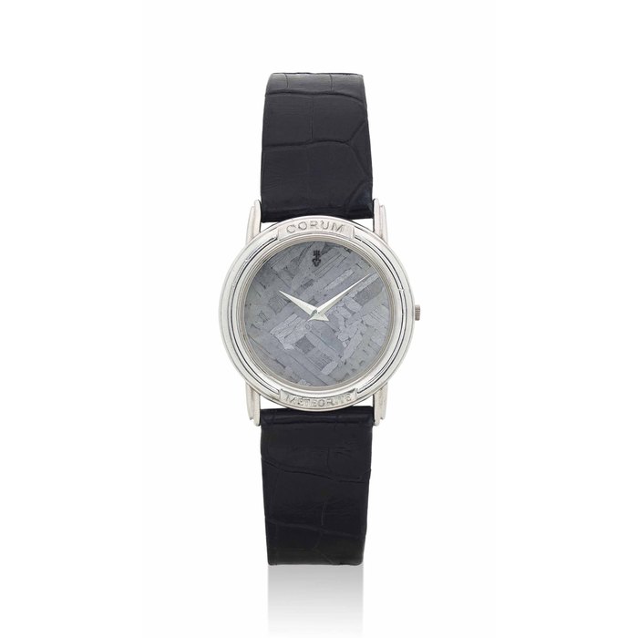 CORUM. A FINE PLATINUM WRISTWATCH WITH METEORITE DIAL SIGNED CORUM, METEORITE, REF.50450-70, CASE NO. 408244, CIRCA 2000
