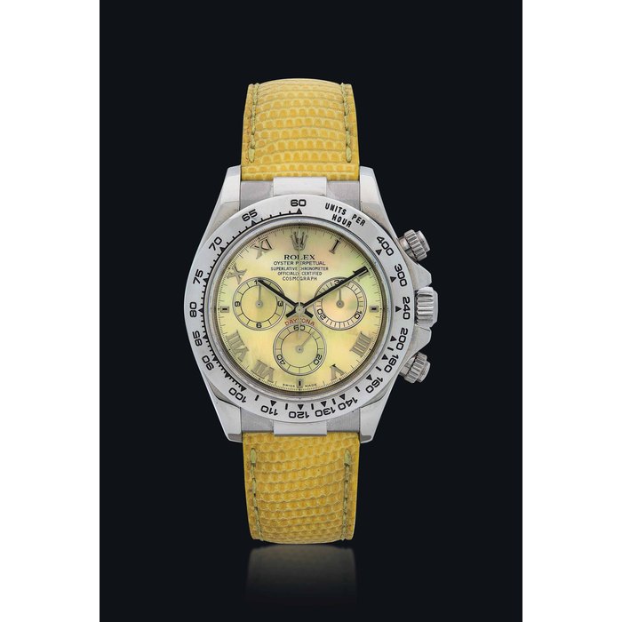 ROLEX. A FINE 18K WHITE GOLD AUTOMATIC CHRONOGRAPH WRISTWATCH WITH YELLOW MOTHER-OF-PEARL DIAL SIGNED ROLEX, OYSTER PERPETUAL, COSMOGRAPH DAYTONA BEACH MODEL, REF. 116519, CASE NO. Y326243, CIRCA 2002