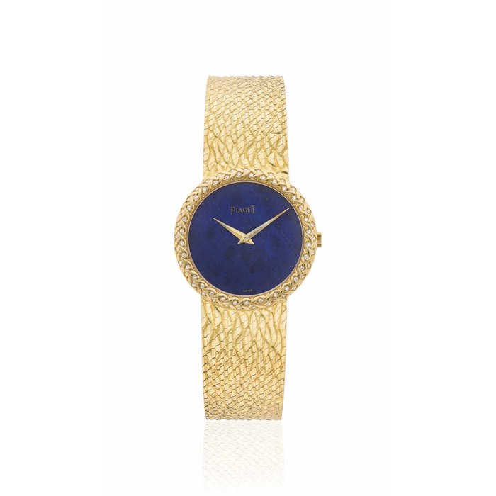 PIAGET. AN 18K GOLD AND DIAMOND-SET WRISTWATCH WITH LAPIS LAZULI DIAL AND BRACELET SIGNED PIAGET, REF. 9042 B 26, CASE NO. 295'344, CIRCA 1970