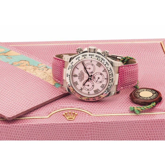 ROLEX. A VERY FINE 18K WHITE GOLD AUTOMATIC CHRONOGRAPH WRISTWATCH WITH PINK MOTHER-OF-PEARL DIAL SIGNED ROLEX, OYSTER PERPETUAL, COSMOGRAPH DAYTONA, BEACH MODEL, REF. 116519, CASE NO. P162560, CIRCA 2000