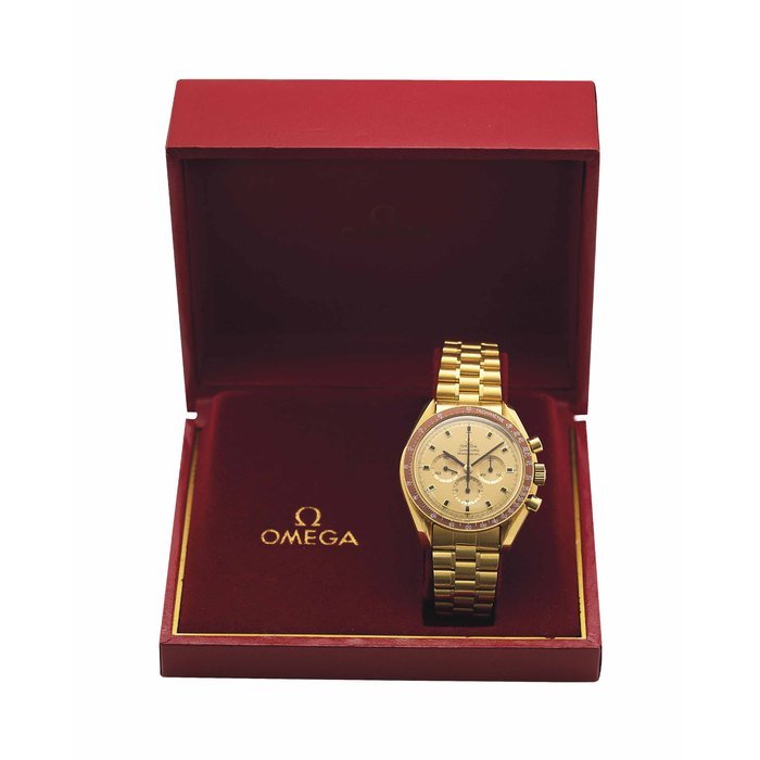 Omega OMEGA. A VERY FINE AND RARE 18K GOLD LIMITED EDITION CHRONOGRAPH WRISTWATCH WITH BRACELET SIGNED OMEGA, SPEEDMASTER PROFESSIONAL, APOLLO XI 1969, NO. 537, REF. 145022 69, CIRCA 1970