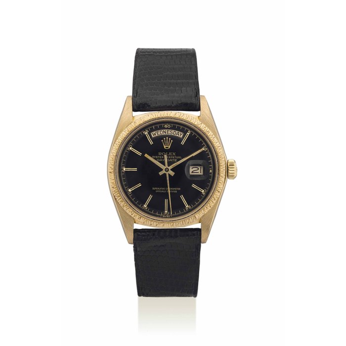 ROLEX. A FINE AND RARE 18K GOLD AUTOMATIC WRISTWATCH WITH SWEEP CENTRE SECONDS, DAY, DATE AND BLACK LACQUERED DIAL SIGNED ROLEX, OYSTER PERPETUAL, DAY-DATE MODEL, REF. 1807, CASE NO. 5'193'344, CIRCA 1977