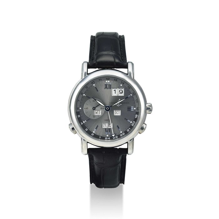 ULYSSE NARDIN. AN 18K WHITE GOLD AUTOMATIC PERPETUAL CALENDAR DUAL TIME WRISTWATCH WITH 24 HOUR AND YEAR INDICATION SIGNED ULYSSE NARDIN, GMT PERPETUAL MODEL, NO. 18, REF. 320-82, MOVEMENT NO. 32’162’276, CIRCA 2000