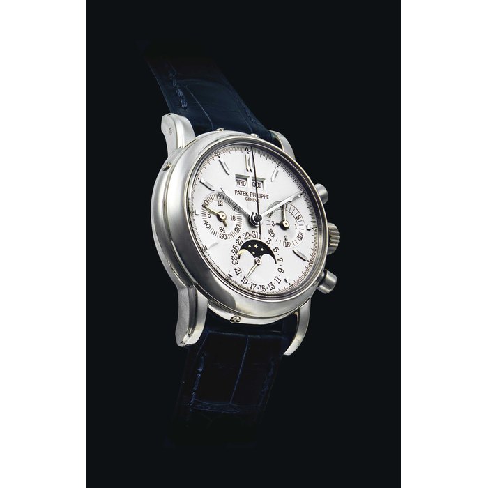 PATEK PHILIPPE. AN 18K WHITE GOLD PERPETUAL CALENDAR CHRONOGRAPH WRISTWATCH WITH MOON PHASES, 24 HOUR AND LEAP YEAR INDICATION SIGNED PATEK PHILIPPE, GENEVE, REF. 3970G, MOVEMENT NO. 876’704, CASE NO. 2’900’826, MANUFACTURED IN 1994